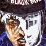 A comic book cover that shows a man's face that is beaten up and covered with white paint.