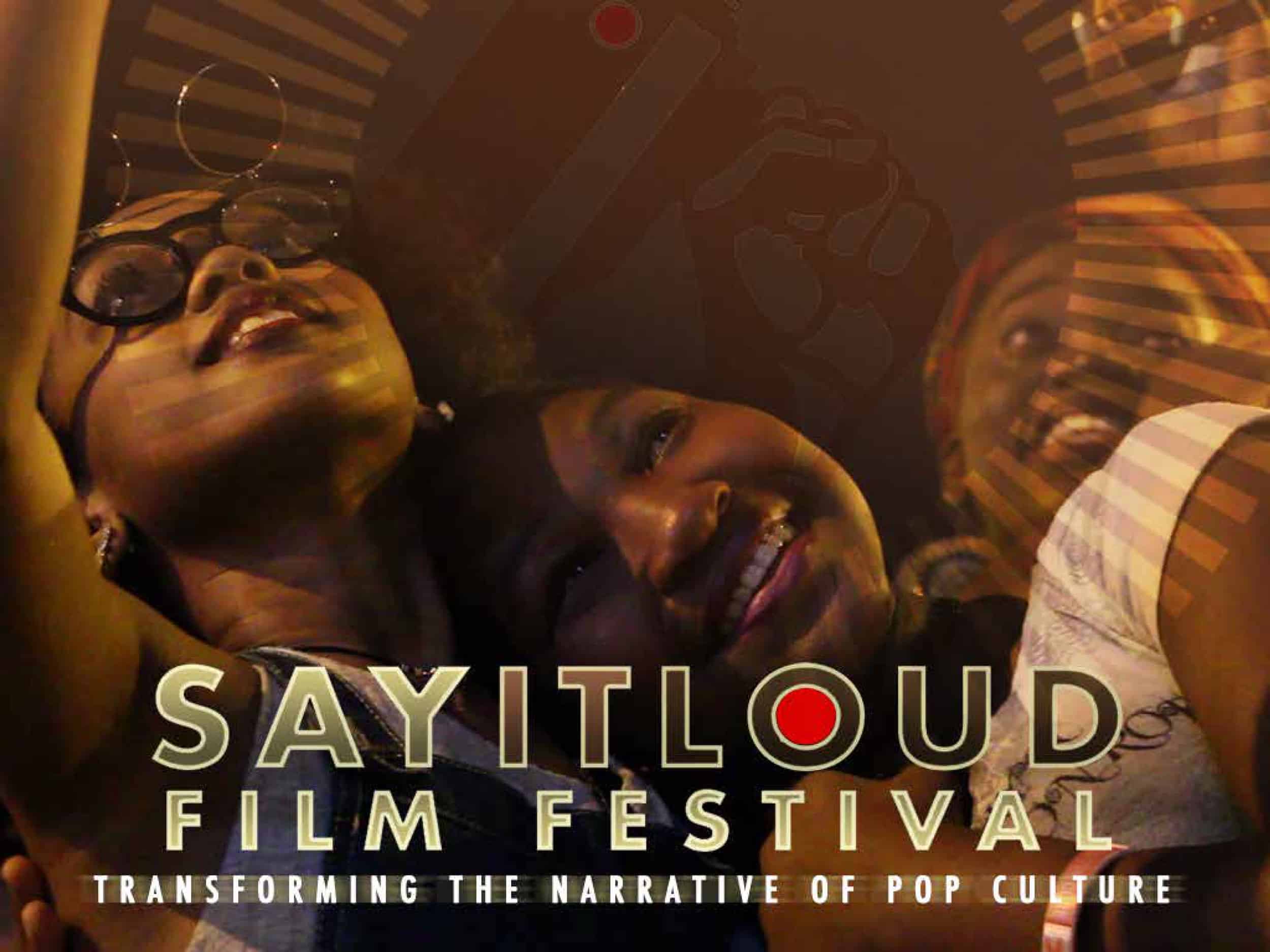 A promotional image for the Say It Loud Film Festival that features smiling faces of people in a crowd.