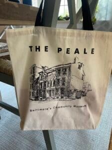 A canvas tote bag that says The Peale.