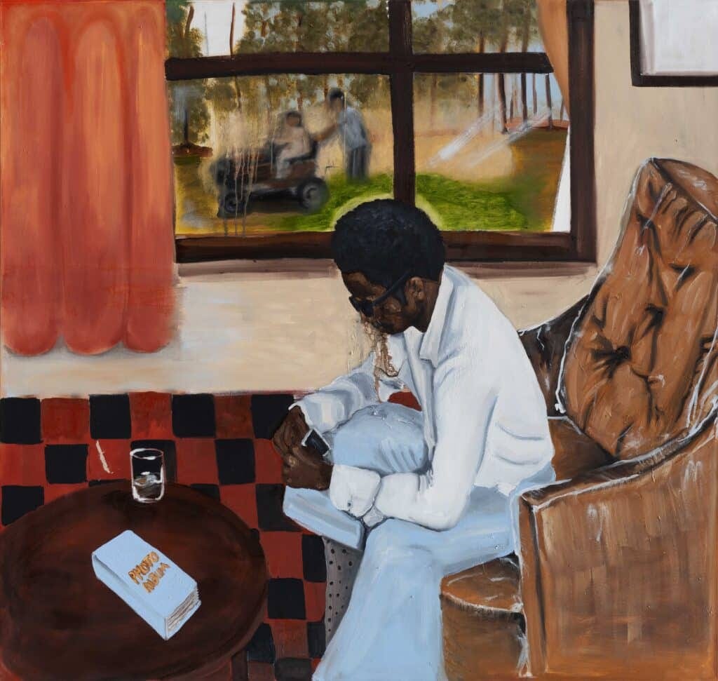 A contemporary, colorful painting of a Black man, who sits in a high-backed chair and looks in a photo album. He is inside a home with orange curtains in the window.